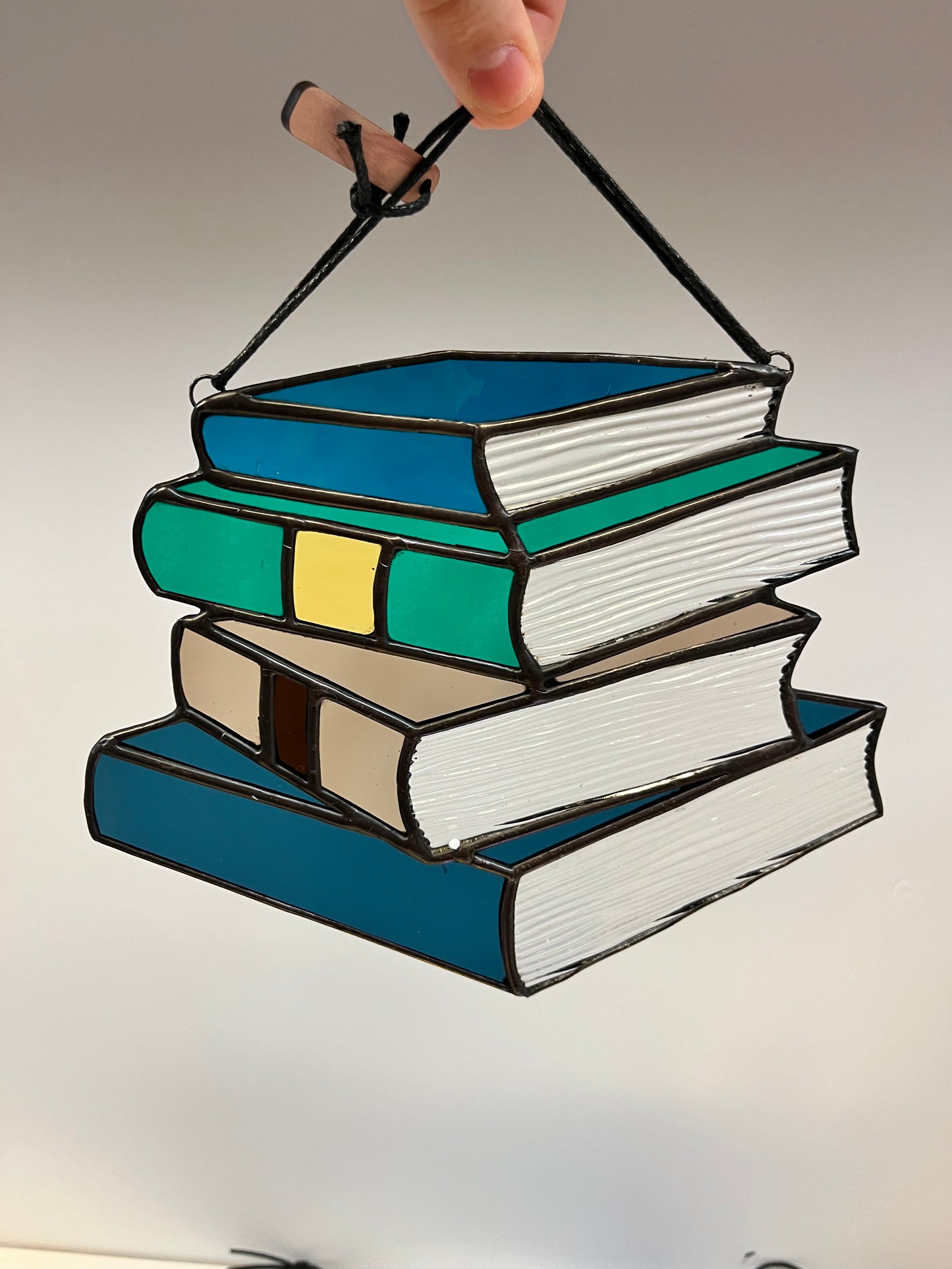 Stained glass book stack