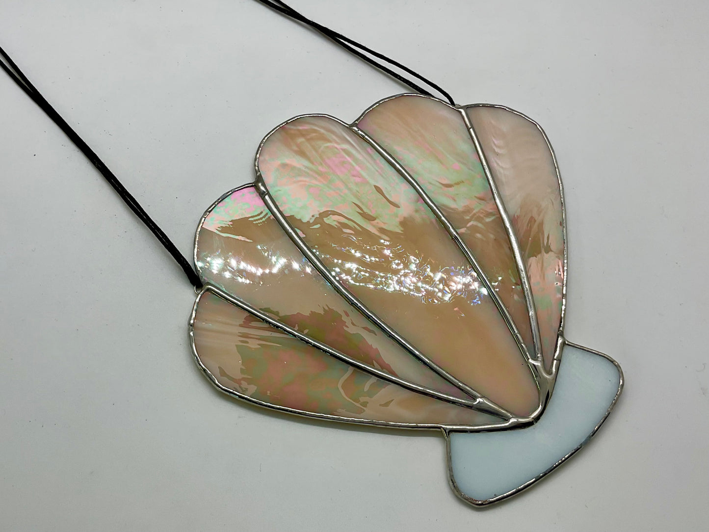 Iridescent peach shell suncatcher