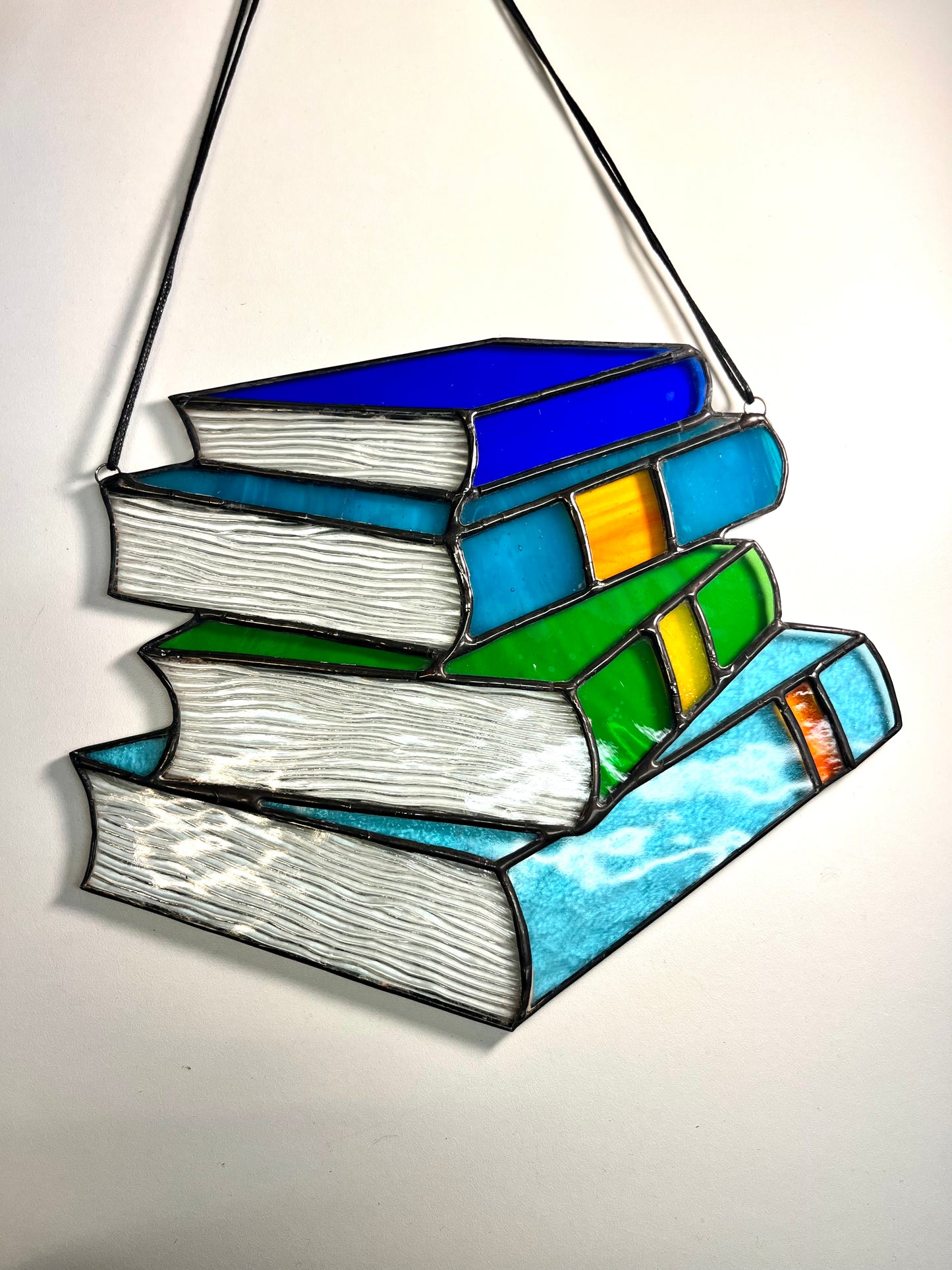 Green and blue book stack