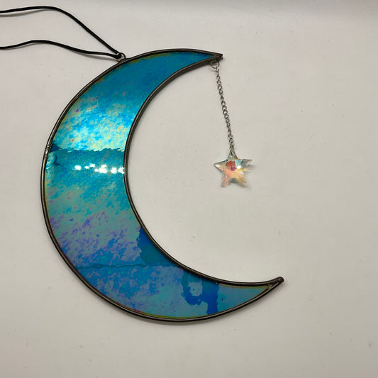Iridescent crescent moon with dichroic star gem