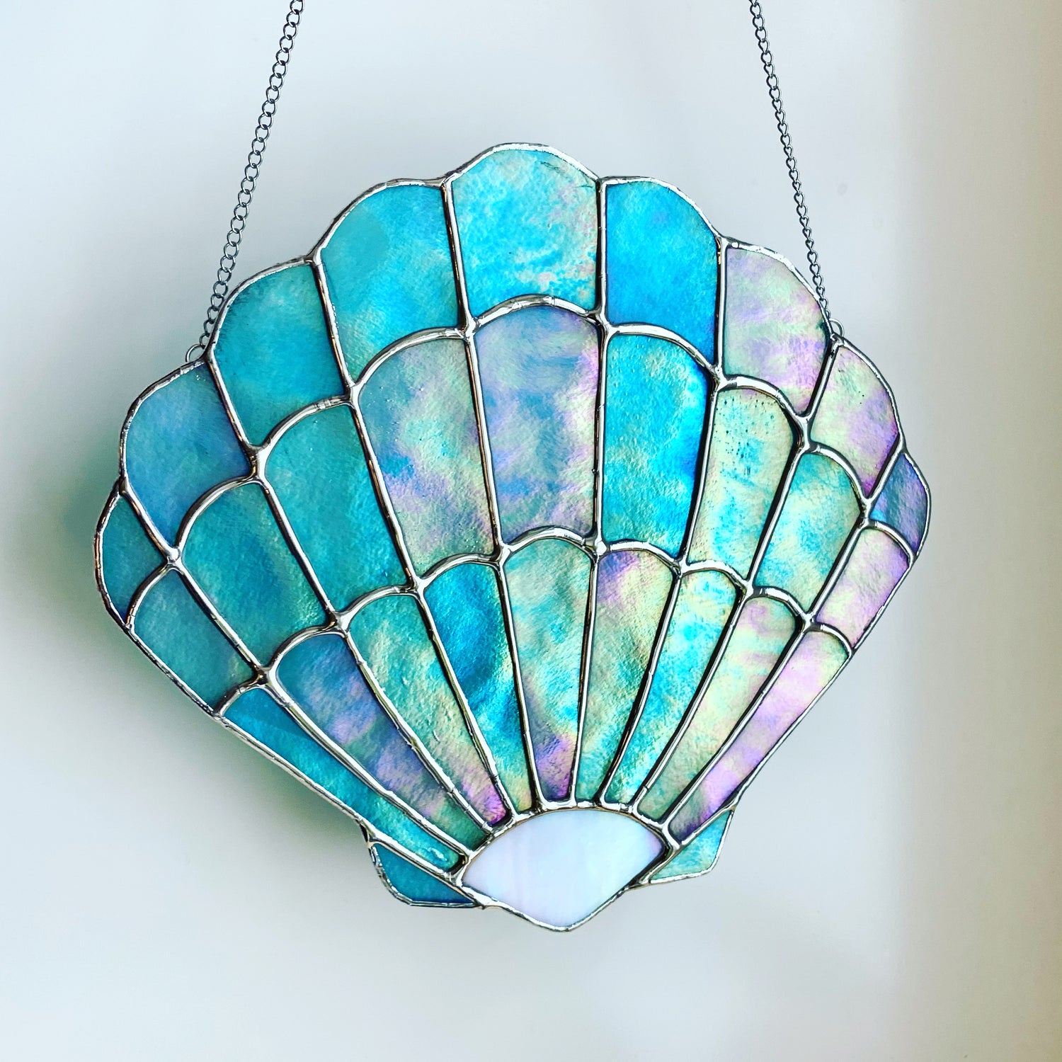 stained glass iridescent teal sea shell