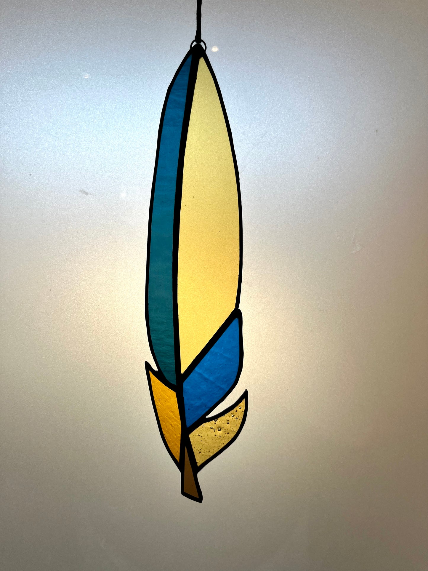 feather- blue and amber