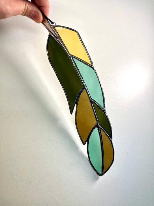 Sage, amber and brown feather